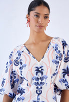 Beyond by Vera cotton poplin blouse showing hand-sewn pearl button detail