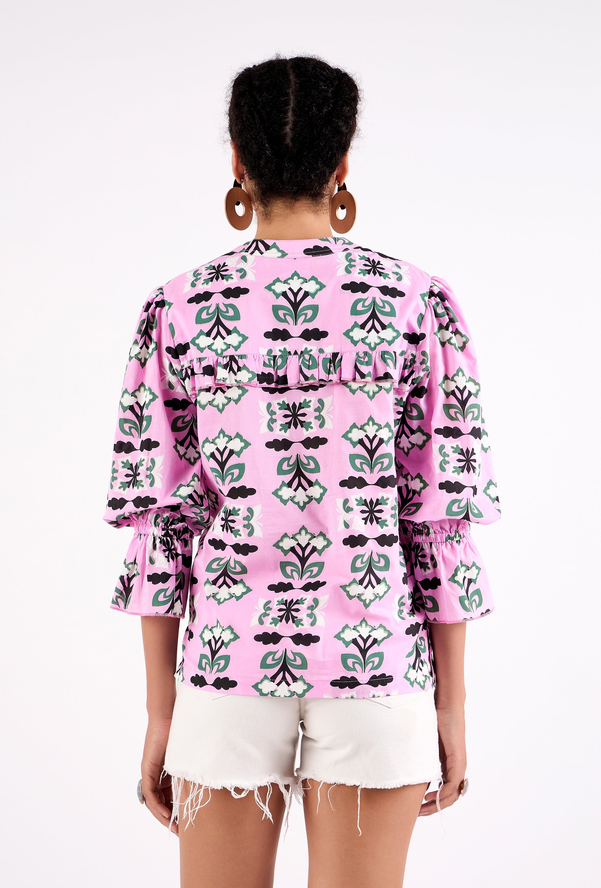 Geometric butterfly and flower print detail on cotton cambric fabric by Beyond by Vera