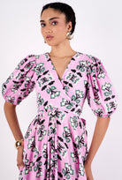 Multicolor floral midi dress by Beyond by Vera, back view with tie detail