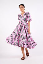 Beyond by Vera Lola dress in multicolor butterfly print, three-quarter view