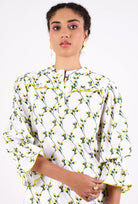 Floral cotton cambric top with crew neckline and ruffle details, back view