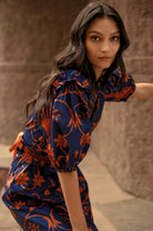 Off-shoulder midi dress by Beyond by Vera showing neckline and sleeve construction