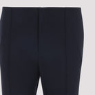 Black virgin wool flare pants by Chloé showing low waist and concealed closure