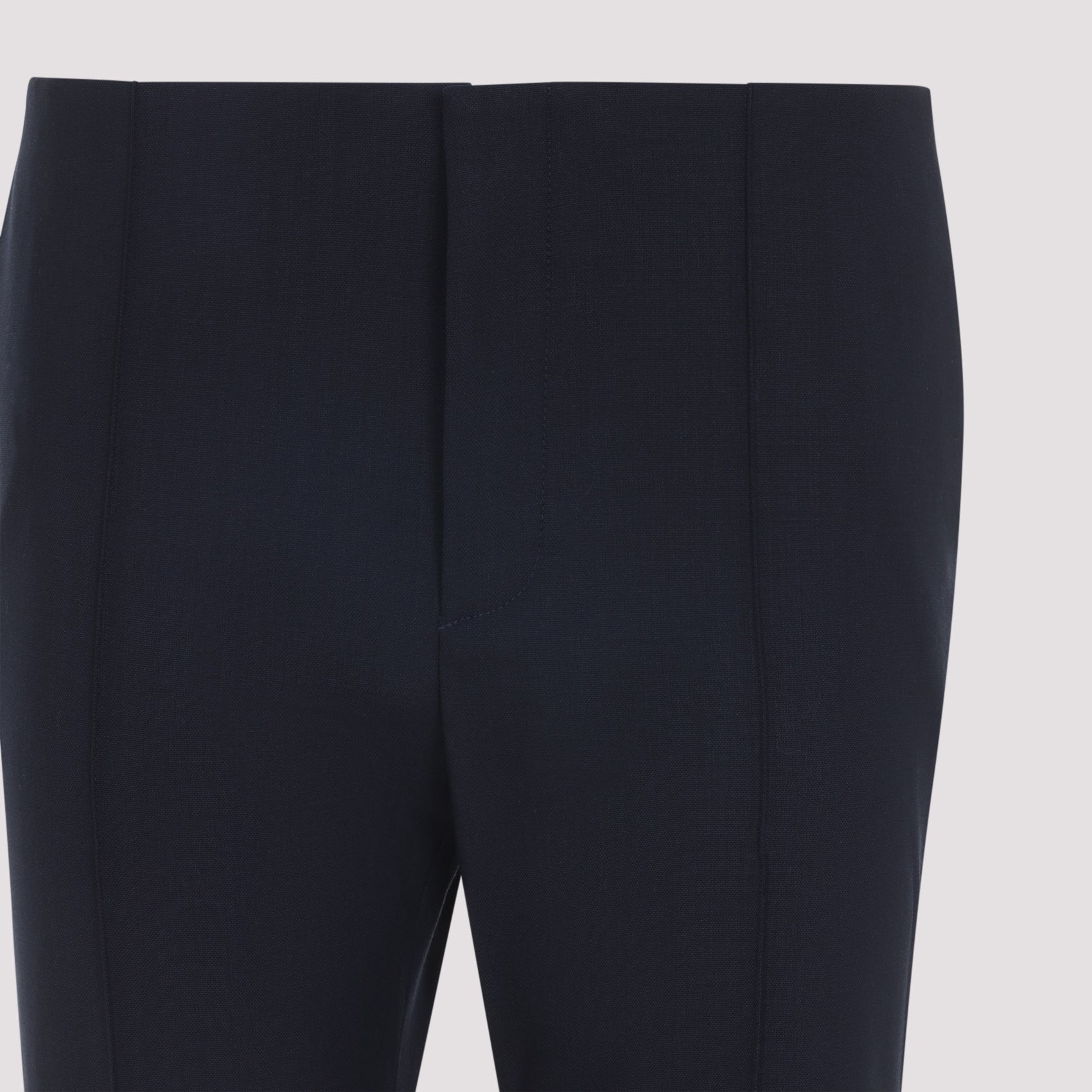 Black virgin wool flare pants by Chloé showing low waist and concealed closure
