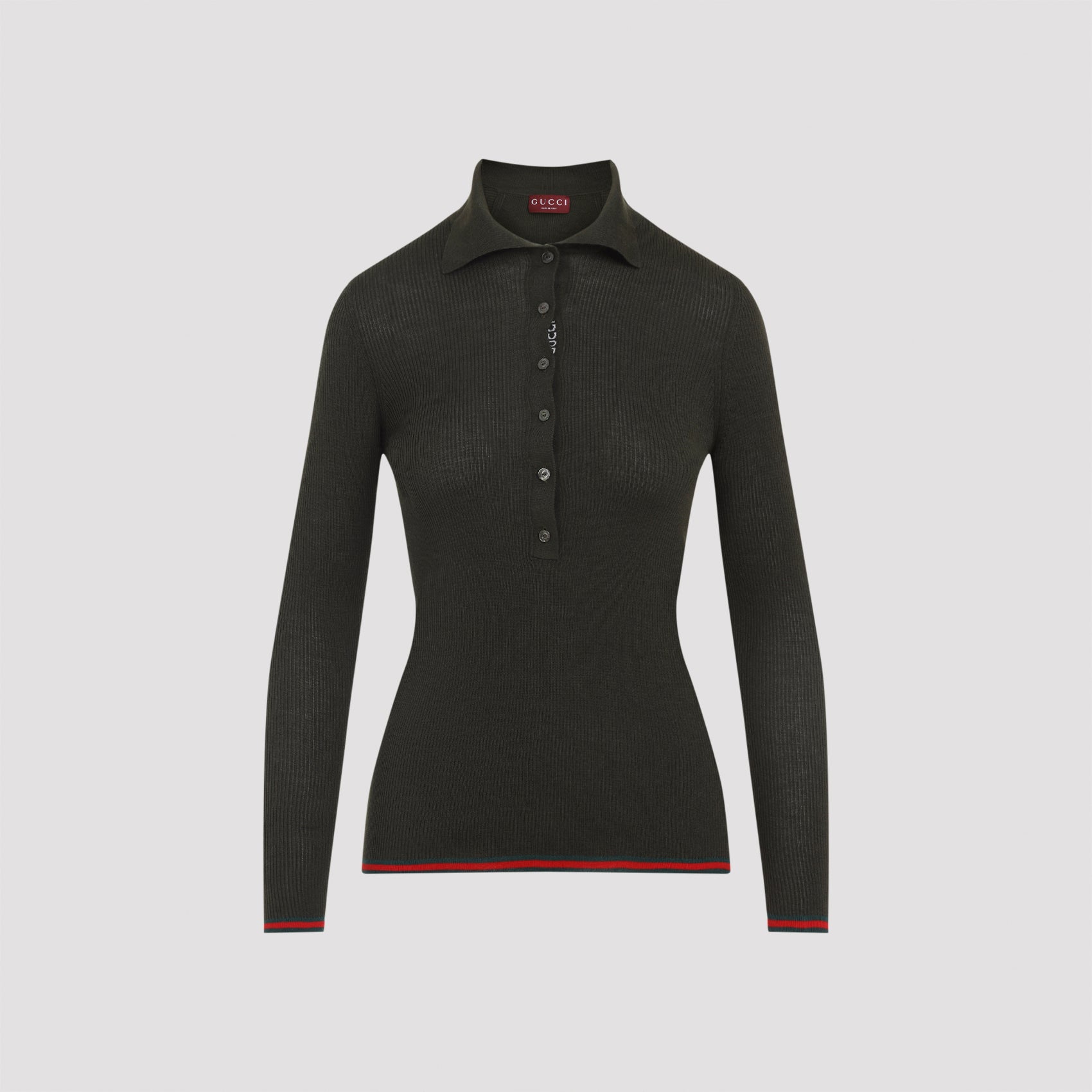 Forest green Gucci cashmere polo, side view showing ribbed texture