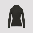 Gucci polo collar detail with logo jacquard placket, close-up