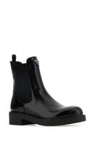 BLACK LEATHER ANKLE BOOTS Prada
