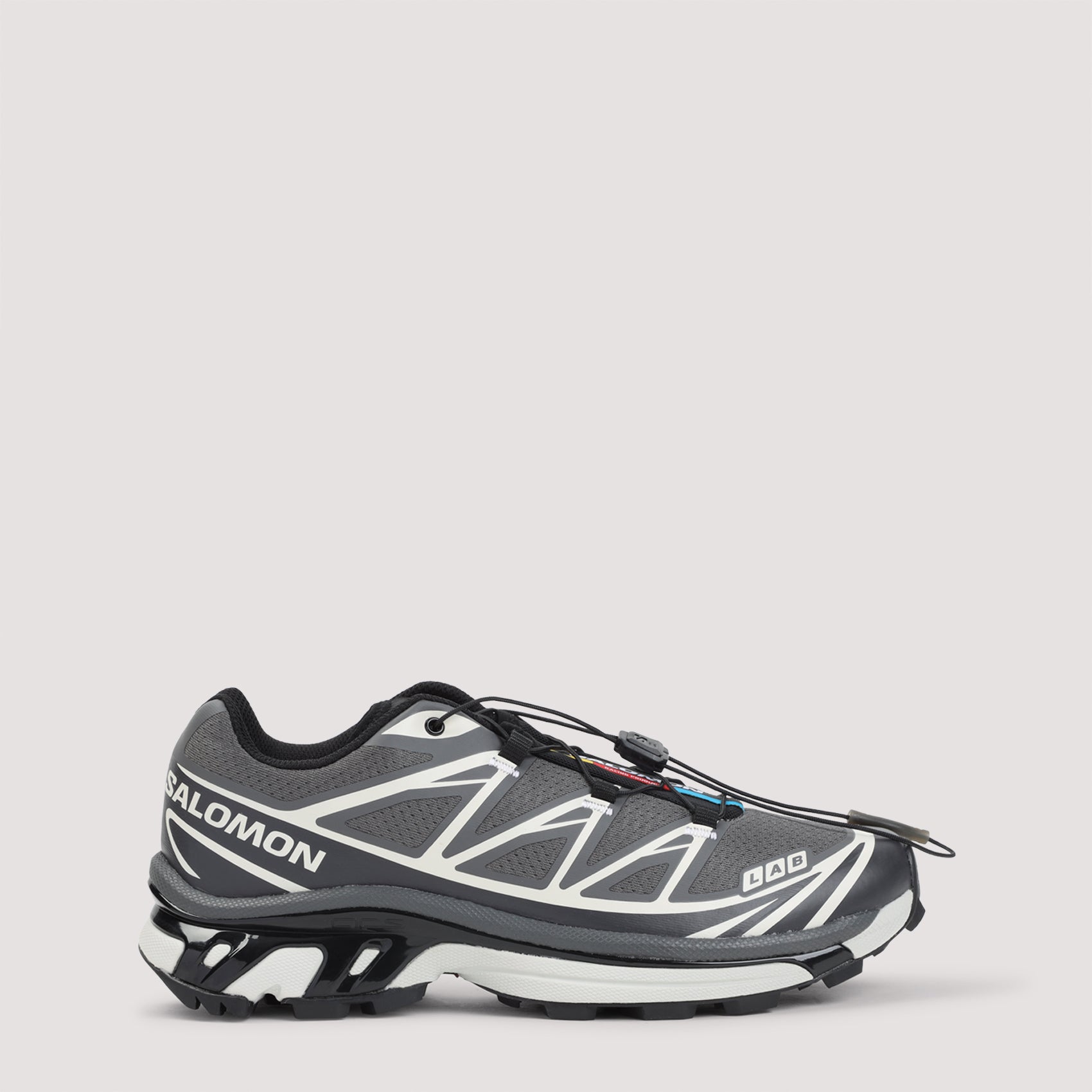 Grey Salomon XT-6 mesh sneakers with white details, side view