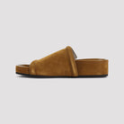 Brown suede slide sandals by PHOEBE PHILO, rear view showing platform sole
