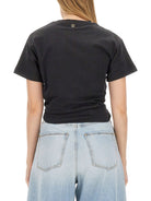 Paco Rabanne black crop top with curved hem, close-up view
