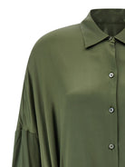 Green silk satin shirt dress with long sleeves and cuffs by Dries Van Noten, back view
