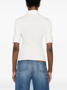 SLIM FIT POLO. Chloé