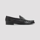 Prada leather loafer showing antiqued strap detail, top view
