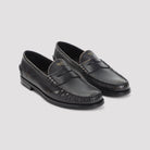 Prada loafer heel counter and sole construction, rear view