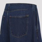 Medium blue wide-leg denim pants by Jil Sander, ankle-length cut detail