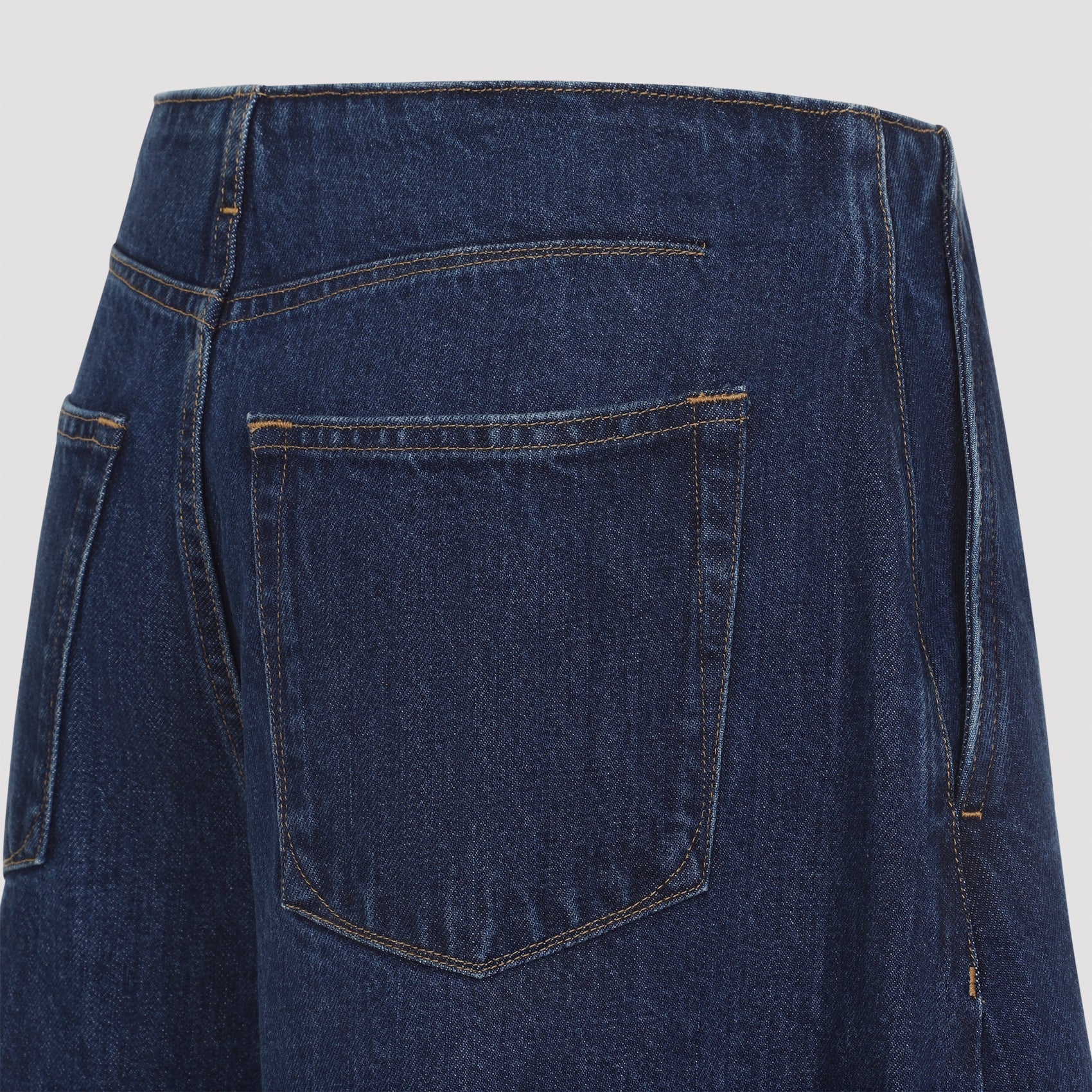 Medium blue wide-leg denim pants by Jil Sander, ankle-length cut detail