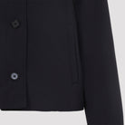 Midnight blue Jil Sander cropped blazer, close-up of technical fabric texture