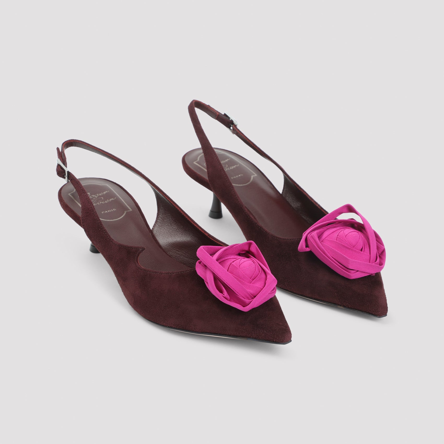 Brown suede slingback pump with sculpted kitten heel by Roger Vivier, angled view