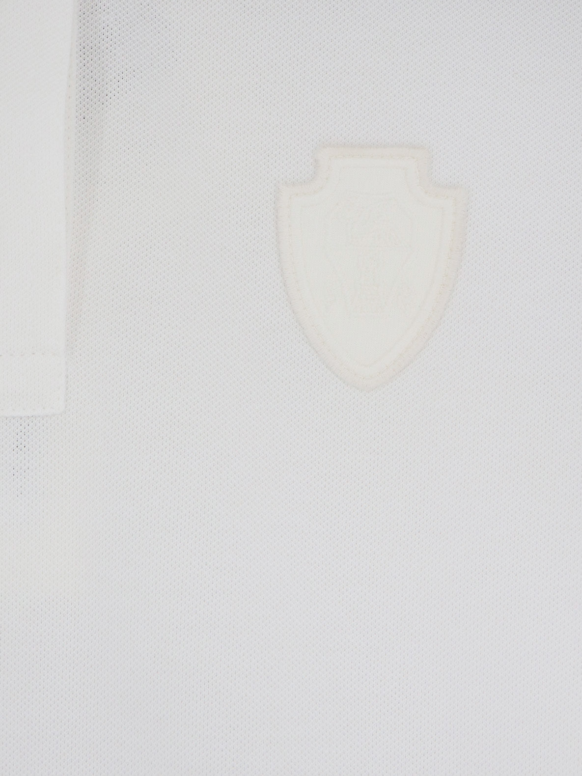White Brunello Cucinelli cotton polo shirt with front logo patch, close-up