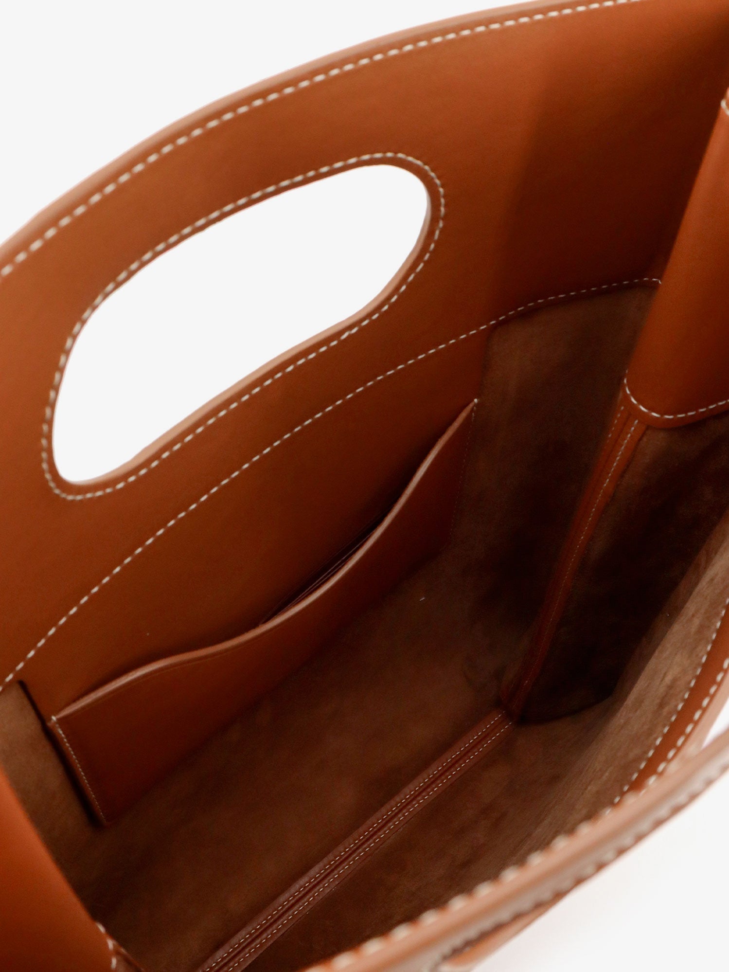 Loro Piana brown tote bag interior showing suede lining and flat pocket