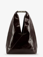 Black glossy leather shoulder bag with metal handle by MM6 Maison Margiela, front view