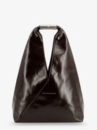 Black MM6 Maison Margiela shoulder bag showing signature back stitching detail