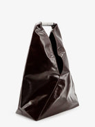 Black glossy leather shoulder bag by MM6 Maison Margiela, side profile view