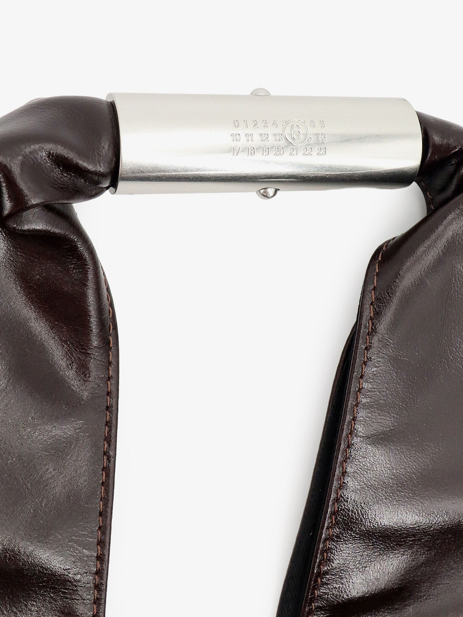 Black glossy leather shoulder bag by MM6 Maison Margiela, interior lining detail