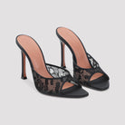 Black lace Alexa slipper by Amina Muaddi, interior leather insole detail