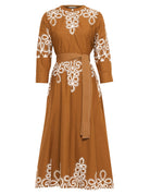 Beyond by Vera silk midi dress on model, rear three-quarter view