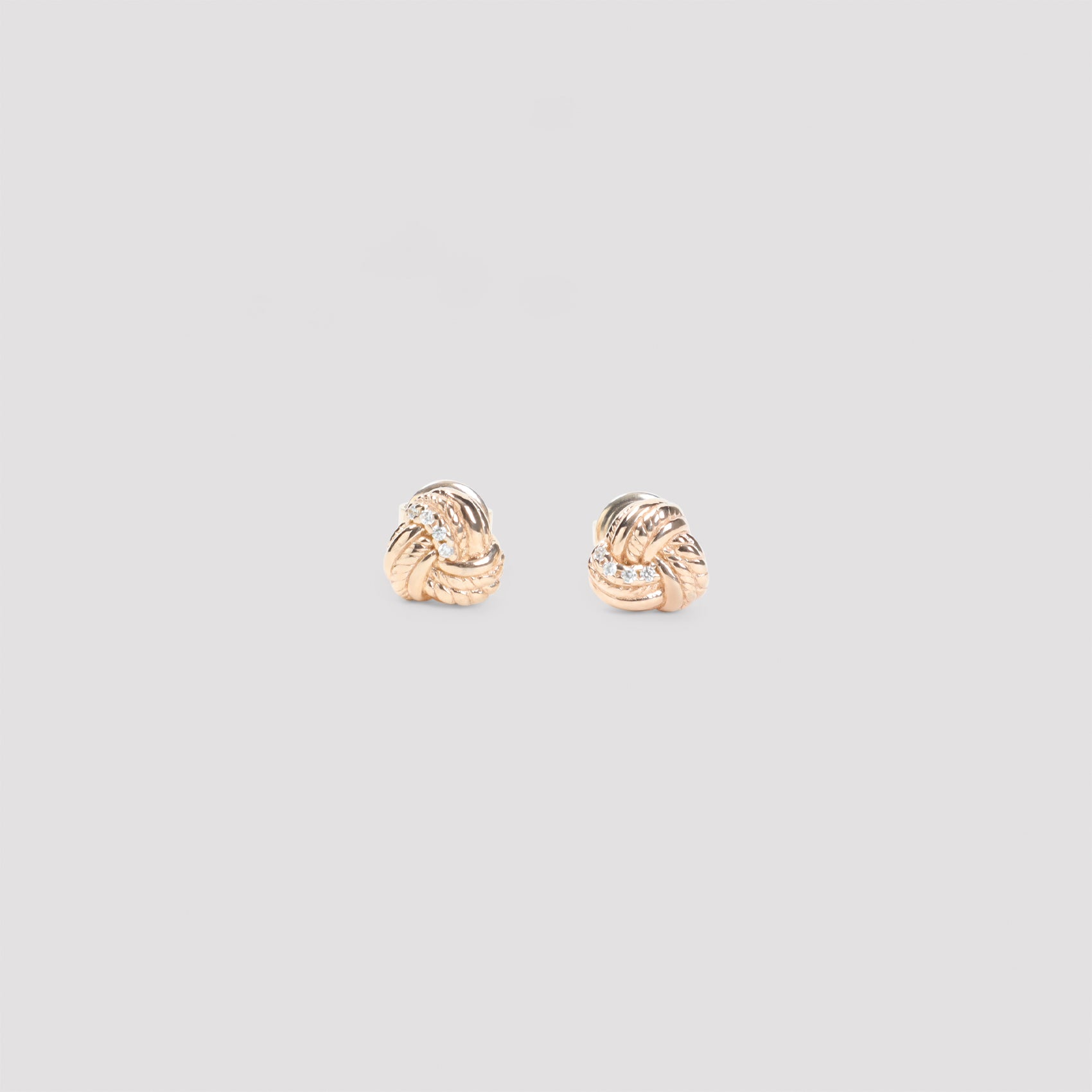 White Bottega Veneta knotted stud earrings with crystal embellishments, front view