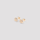 White Bottega Veneta knotted stud earrings with butterfly fastening, back view