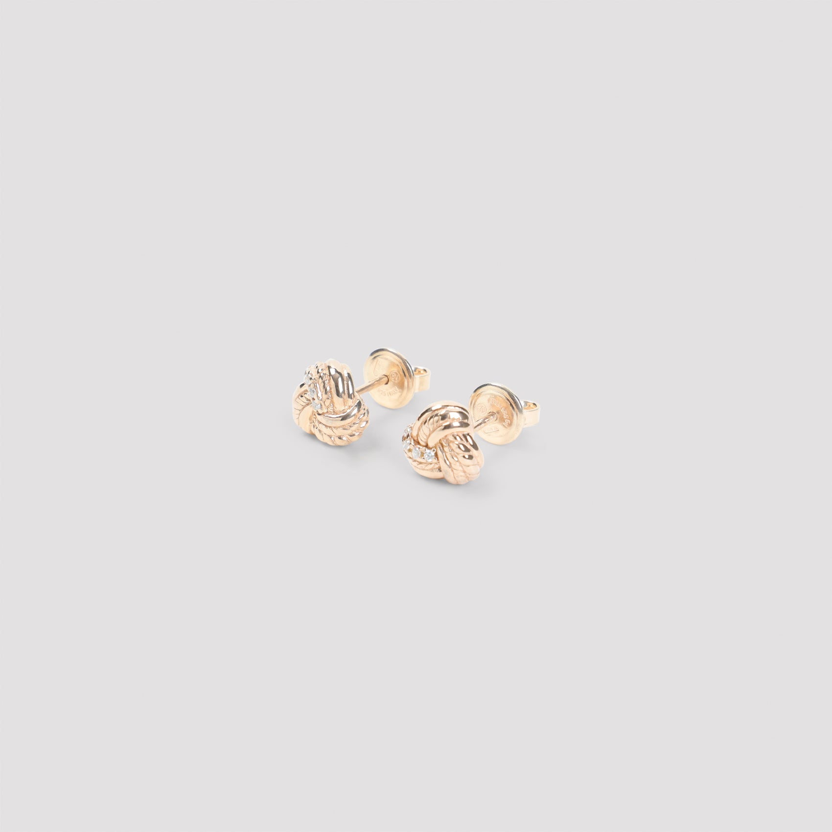 White Bottega Veneta knotted stud earrings with butterfly fastening, back view
