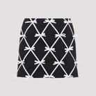 Black Moschino virgin wool mini skirt with ribbon lattice and bow appliqués, front view