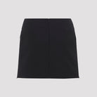 Black Moschino virgin wool mini skirt showing bow appliqué detail, close-up