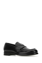BLACK LEATHER LOAFERS Prada