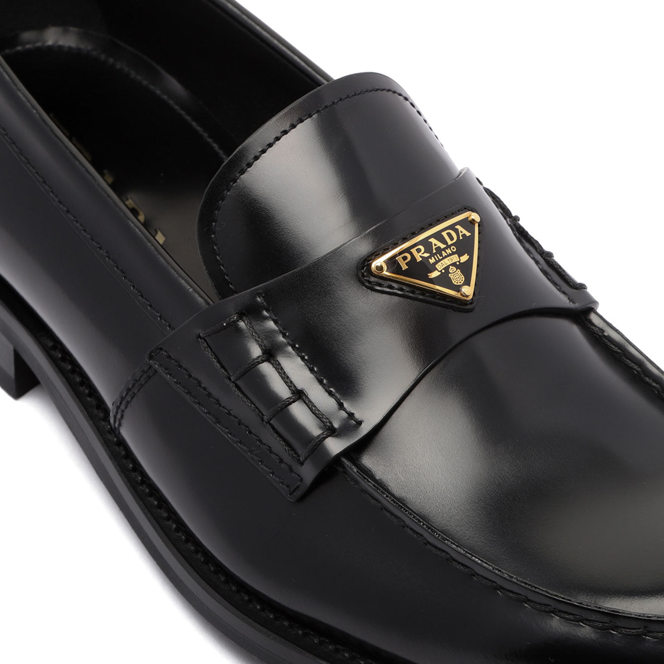 BRUSHED LEATHER LOAFERS Prada