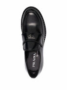 BLACK LEATHER LOAFERS Prada