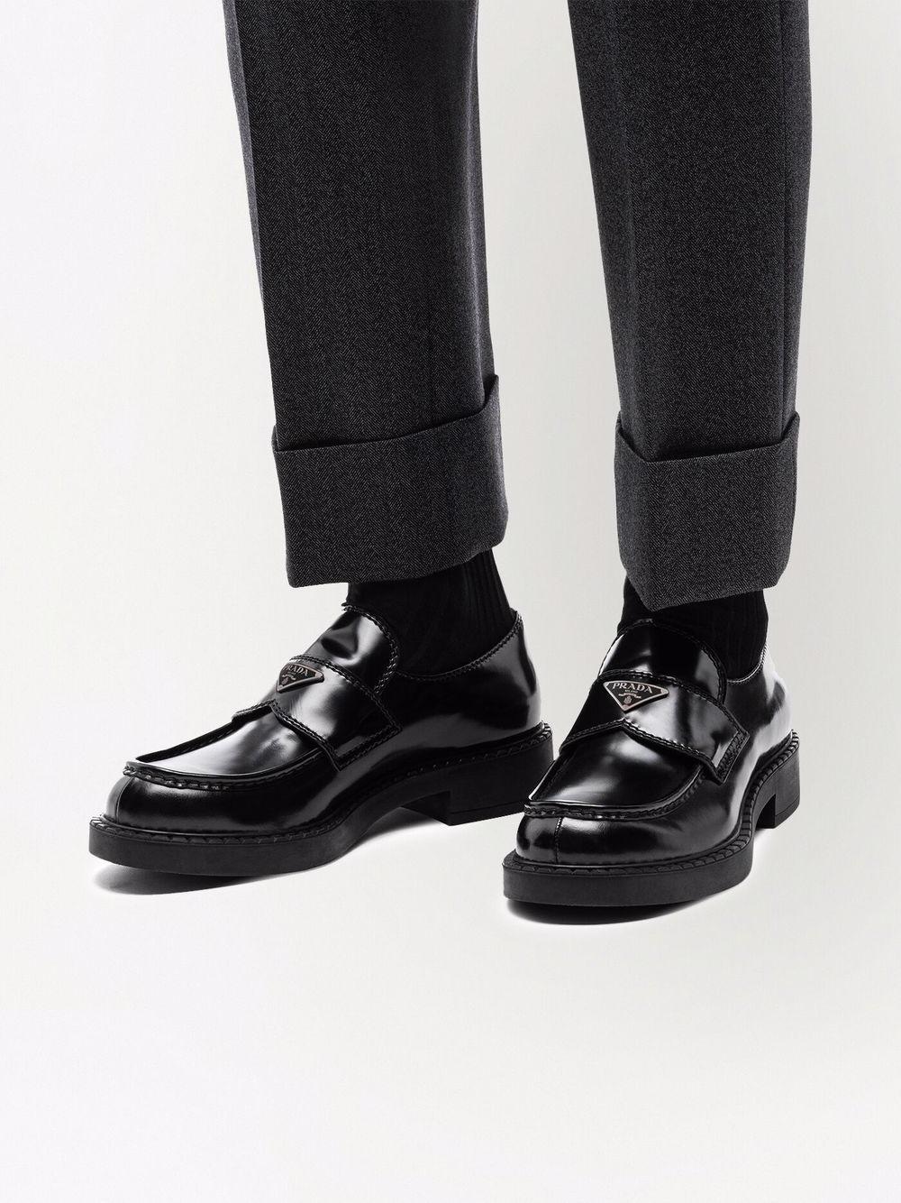 BLACK LEATHER LOAFERS Prada
