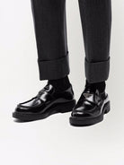 BLACK LEATHER LOAFERS Prada