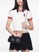 Marc Jacobs chain mini bag in black leather, back view