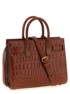 Brown Saint Laurent Nano Sac De Jour satchel, side view showing gusset straps