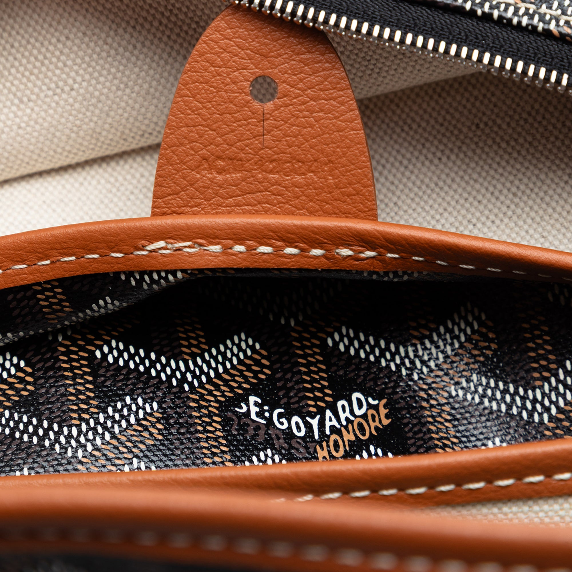Black Goyard Artois PM tote bag interior showing slip pocket
