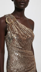 Bronze sequin gown detail showing metallic embellishment and draping