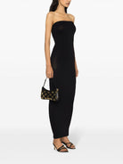 Black Wolford Long Fatal maxi dress, side angle view