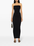 Black Wolford maxi dress with sweetheart neckline, close-up detail
