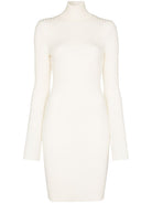Beige ribbed knit mini dress with roll neck by Wolford, front view
