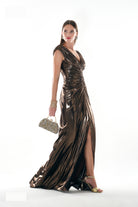 Bronze metallic gown with thigh-high slit, studio shot by Lord & Taylor Heritage
