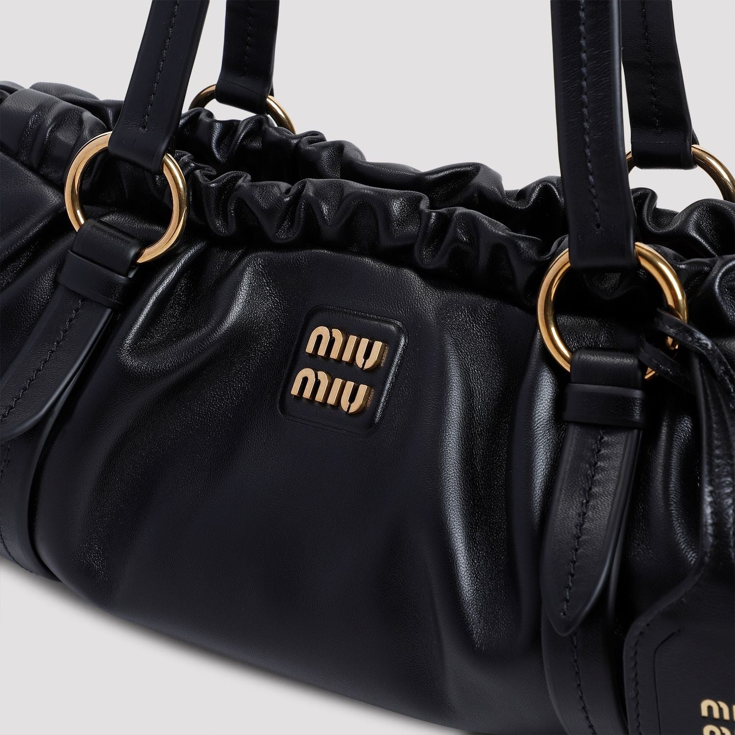 BLACK LEATHER JOIE SHOULDER BAG Miu Miu