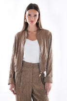 Metallic satin bomber jacket worn open over white top by Lord & Taylor Heritage